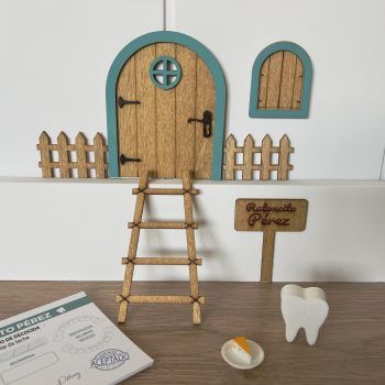 Ejemplo de colocación de la puerta ratoncito Pérez turquesa