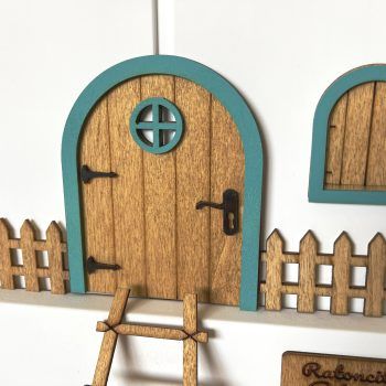 Puerta ratoncito Pérez turquesa en su packaging original con todos sus accesorios